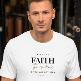 Model wearing white Keep the Faith Christian tee