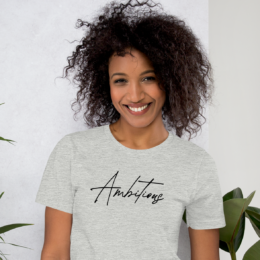 Model wearing Athletic Heather Ambitious Tee with minimalist statement script design