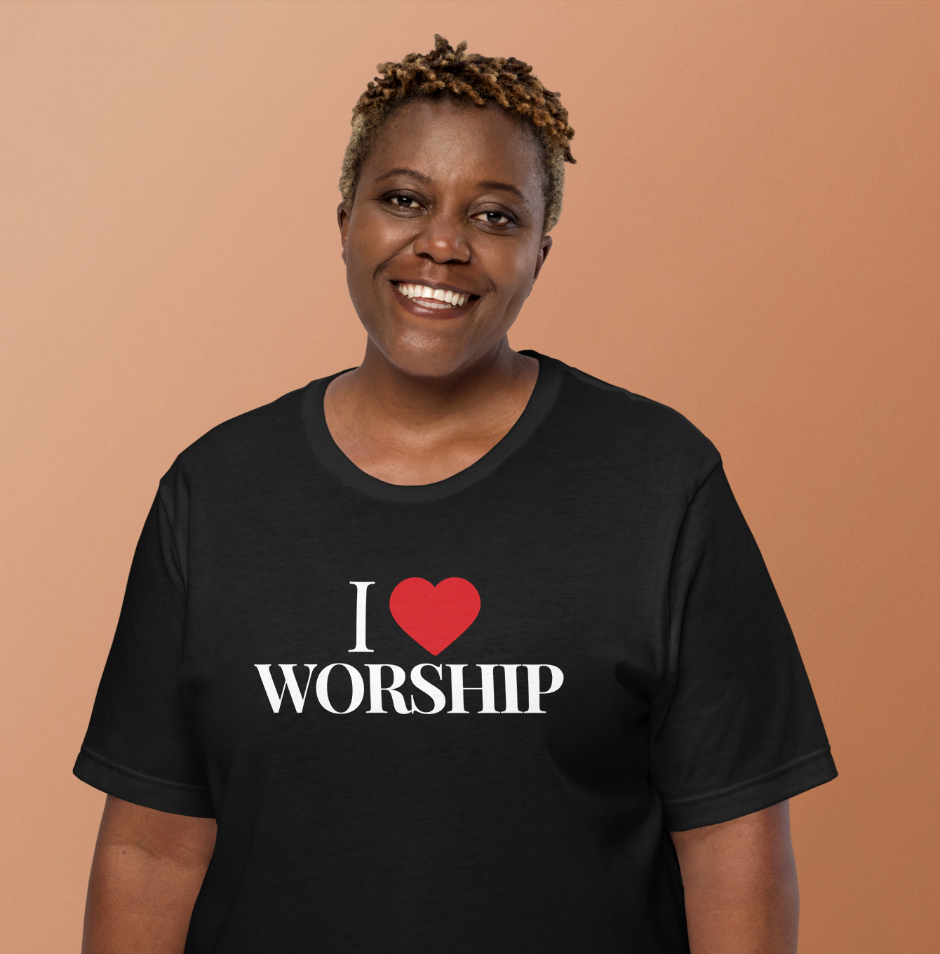 Model wearing black I Love Worship Tee with red heart design